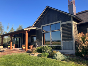 An image of a home with green grass and a front yard